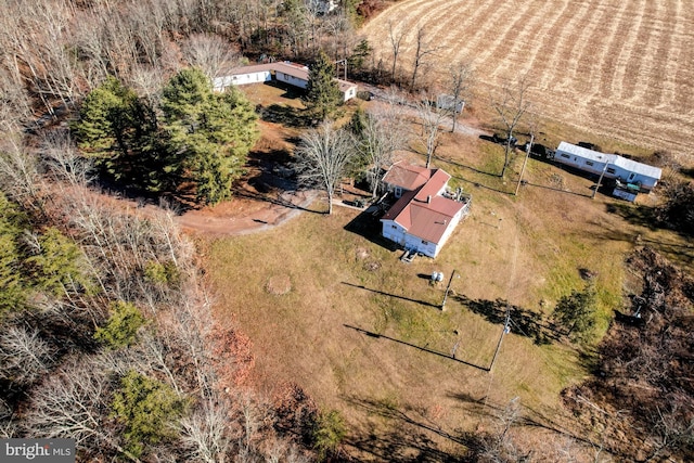 birds eye view of property with a rural view