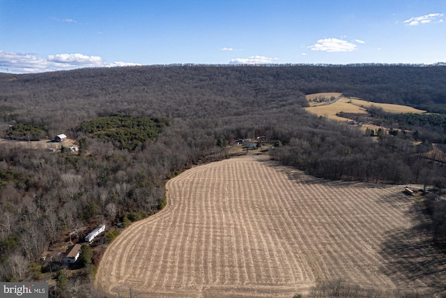 birds eye view of property with a rural view