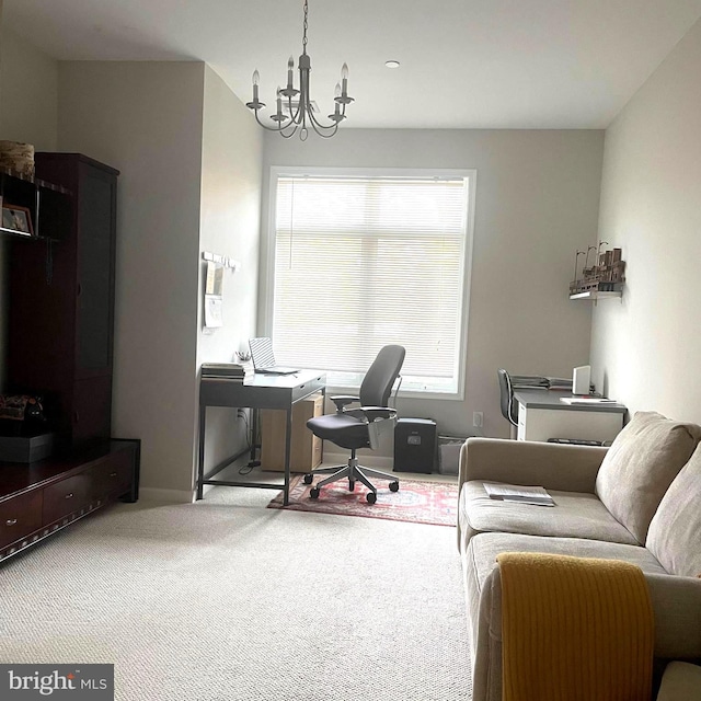 carpeted office featuring a notable chandelier