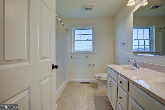 full bathroom featuring toilet, a sink, visible vents, a shower, and double vanity