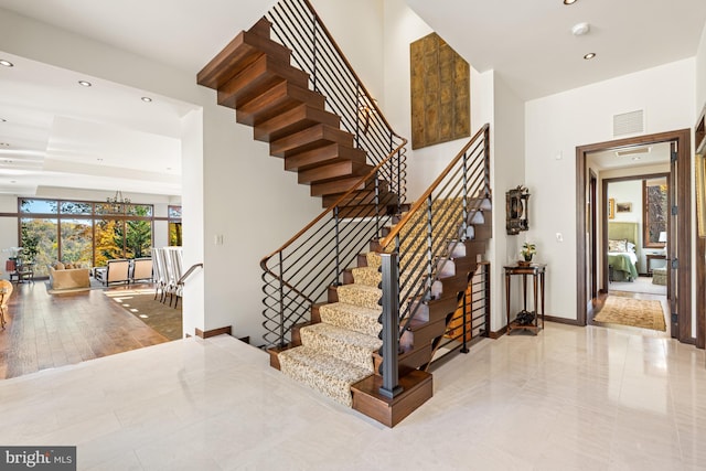 stairway with light tile flooring