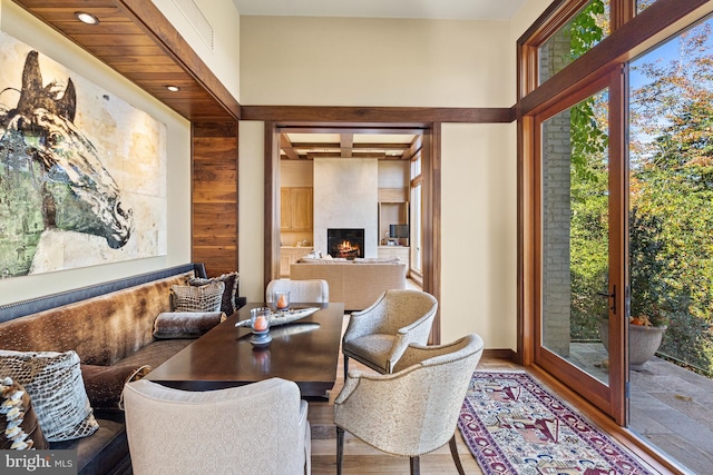 interior space featuring a high ceiling and hardwood / wood-style floors