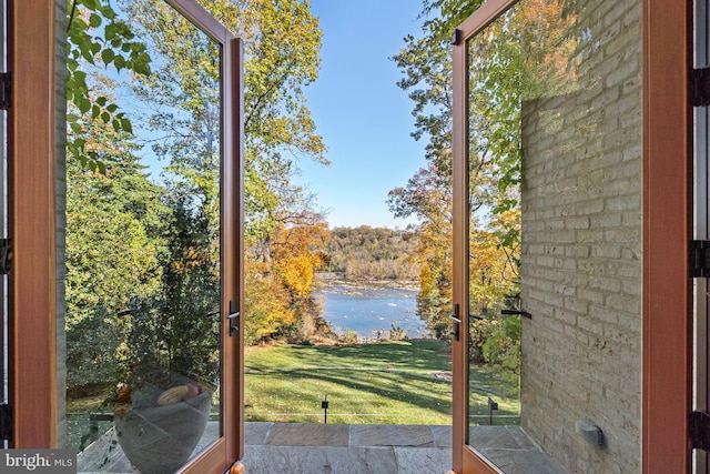 entryway with a water view