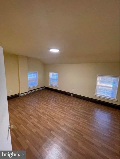 empty room with wood-type flooring