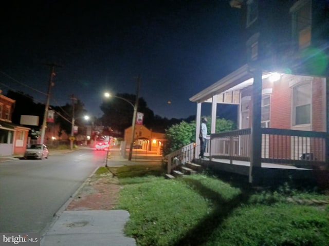 view of yard at night