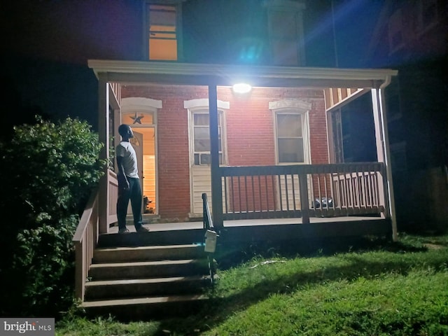 view of back house at night