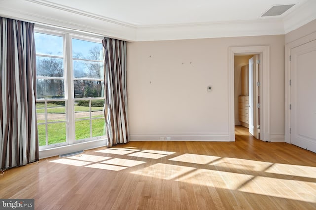 10111 Iron Gate Rd, Potomac, MD 20854 - unfurnished room featuring crown molding and light hardwood / wood-style floors