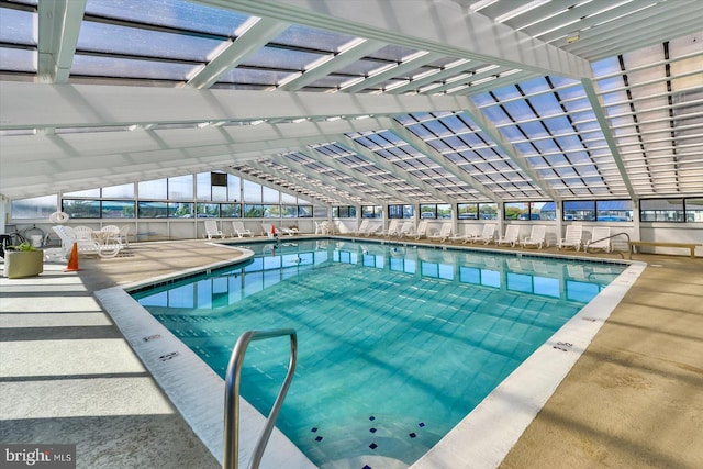 view of swimming pool featuring a pergola