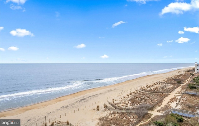 view of water feature with a beach view