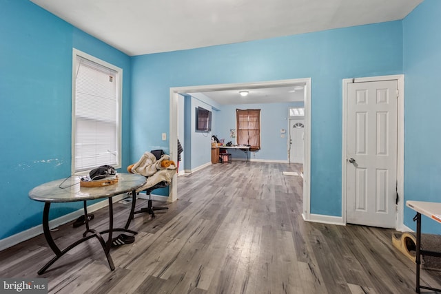 interior space with dark hardwood / wood-style flooring