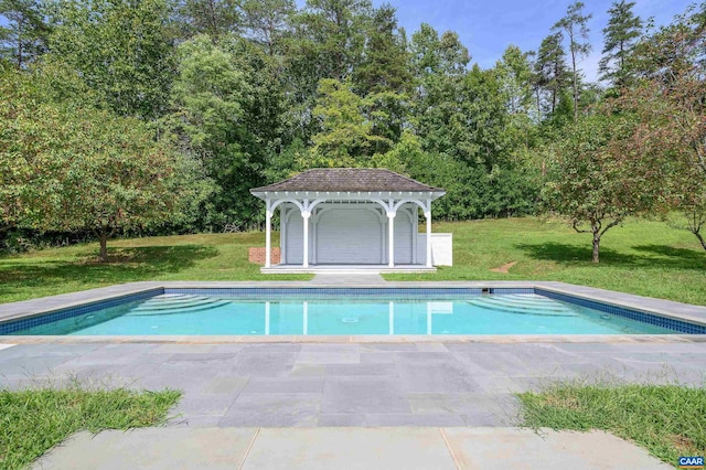 view of pool featuring a yard and a gazebo