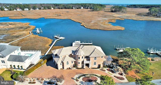 birds eye view of property featuring a water view