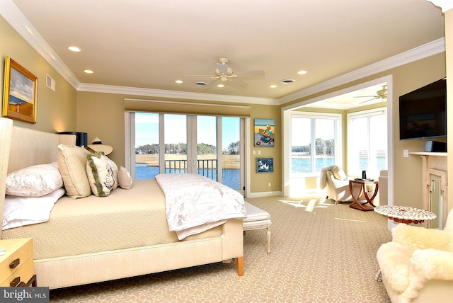 bedroom with crown molding, a water view, multiple windows, carpet flooring, and access to outside