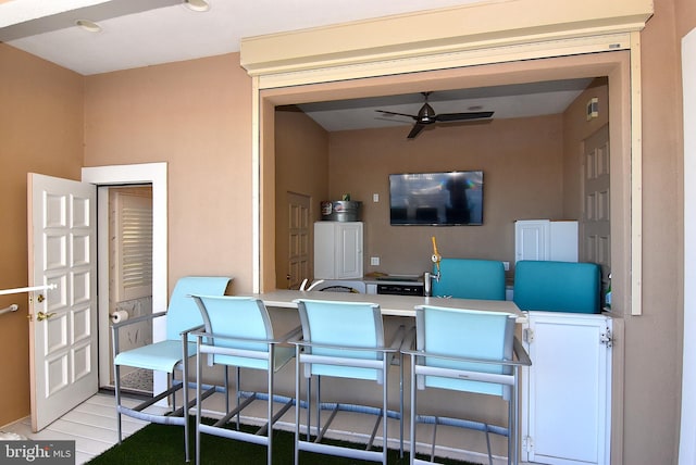 view of patio / terrace featuring ceiling fan