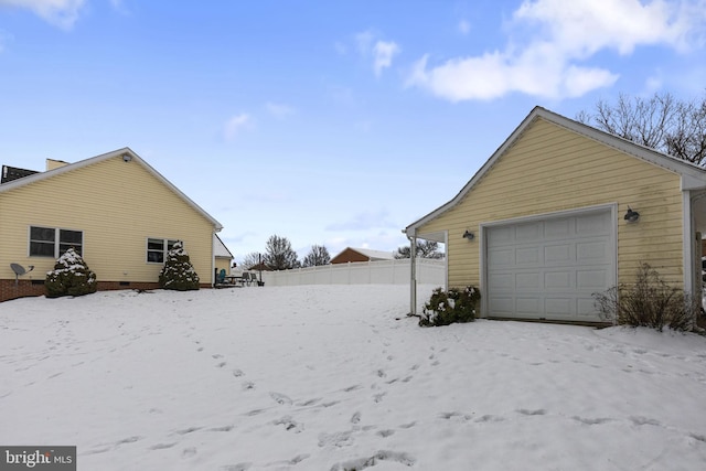 exterior space with a garage