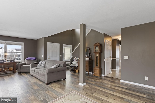 living room featuring dark wood-type flooring