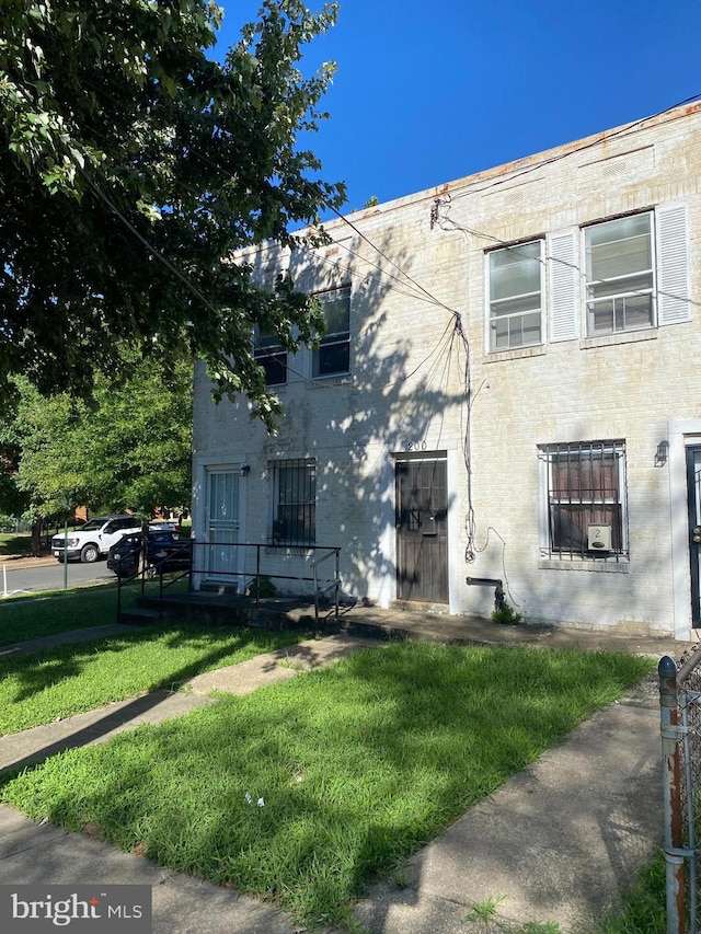 exterior space featuring a front lawn