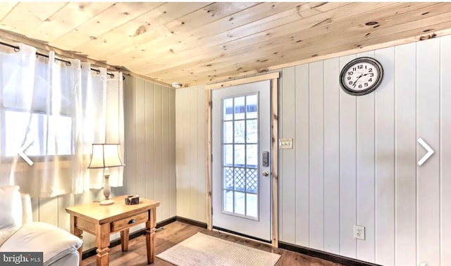 doorway with wooden ceiling and wood-type flooring