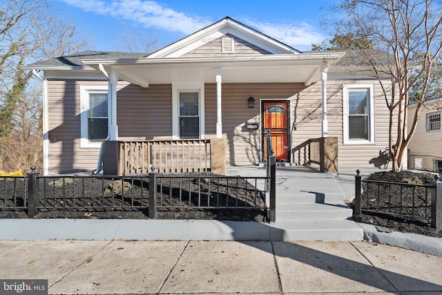 view of front of property featuring covered porch