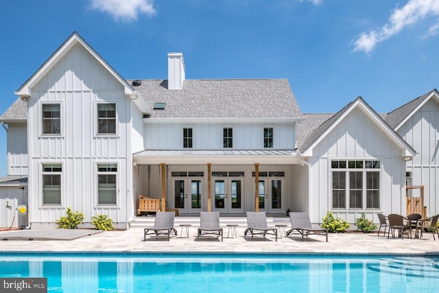 back of property featuring french doors and a patio