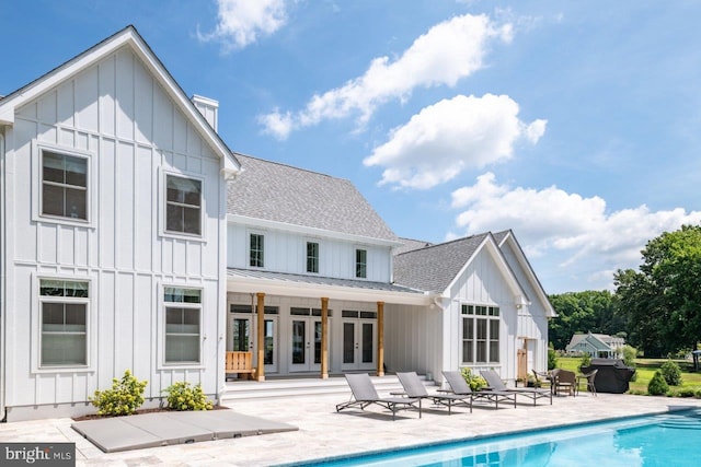 back of property featuring french doors and a patio area