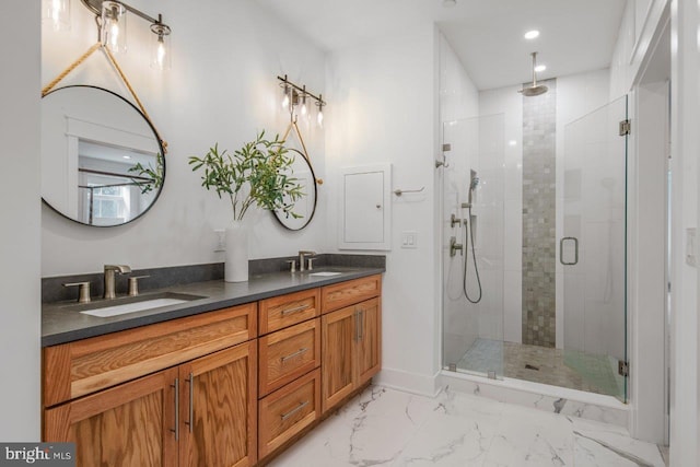 bathroom with tile flooring, dual vanity, and walk in shower