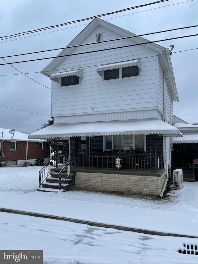 view of front of home with central AC unit