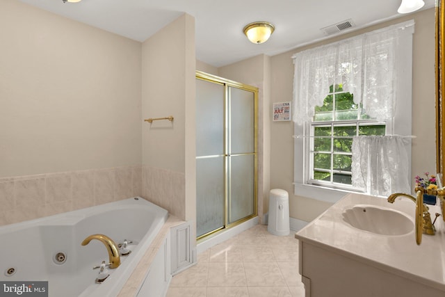 bathroom featuring separate shower and tub, tile flooring, and vanity