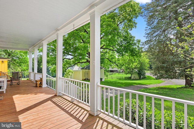 deck featuring a yard