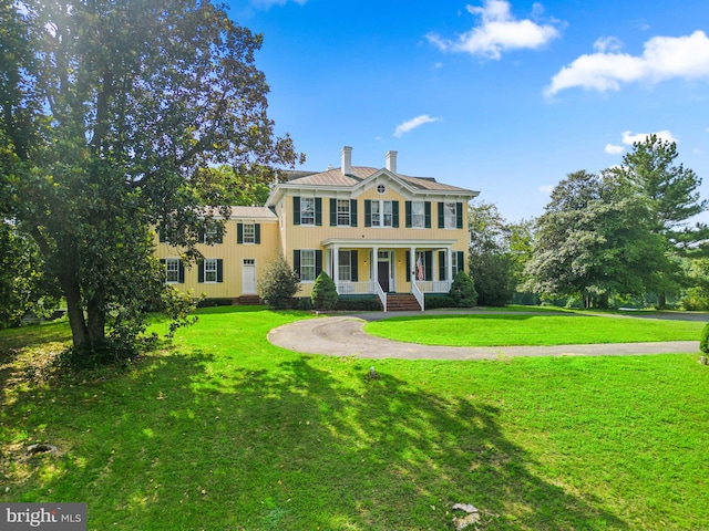 view of front of house with a front yard