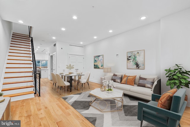 living room with light hardwood / wood-style floors