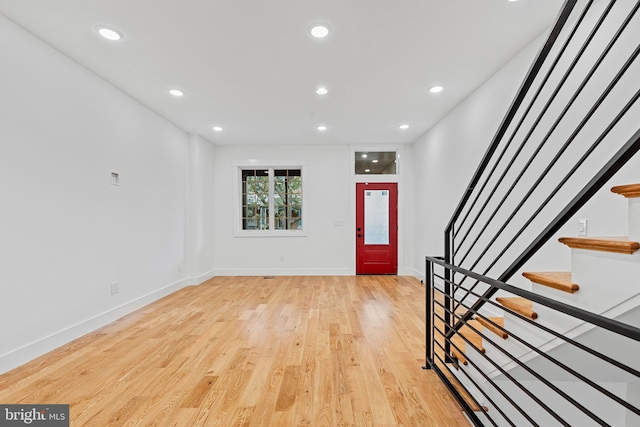 entryway with light hardwood / wood-style floors