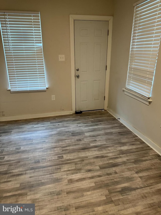 spare room featuring hardwood / wood-style floors