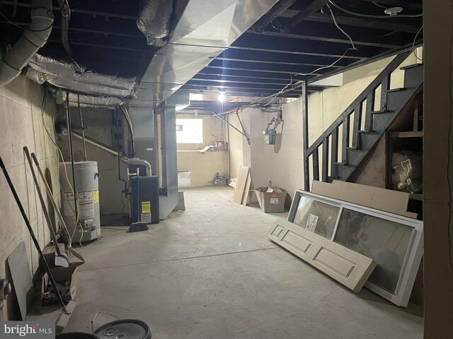 basement featuring gas water heater