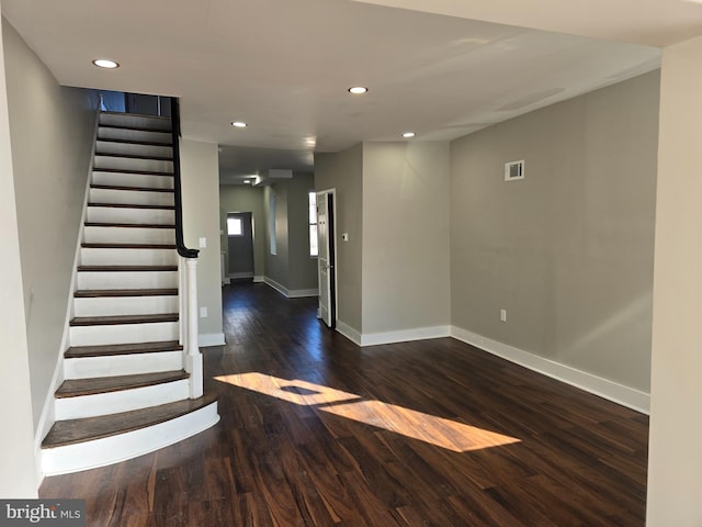 empty room featuring dark hardwood / wood-style floors