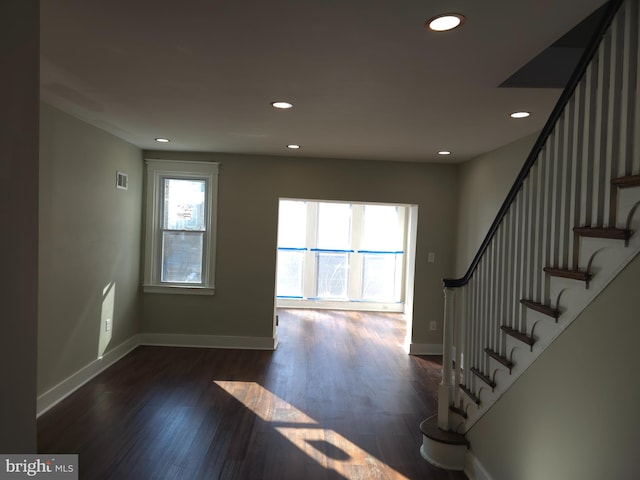 interior space with dark wood-type flooring