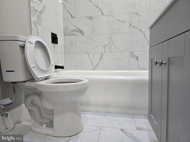 bathroom featuring tile floors and toilet