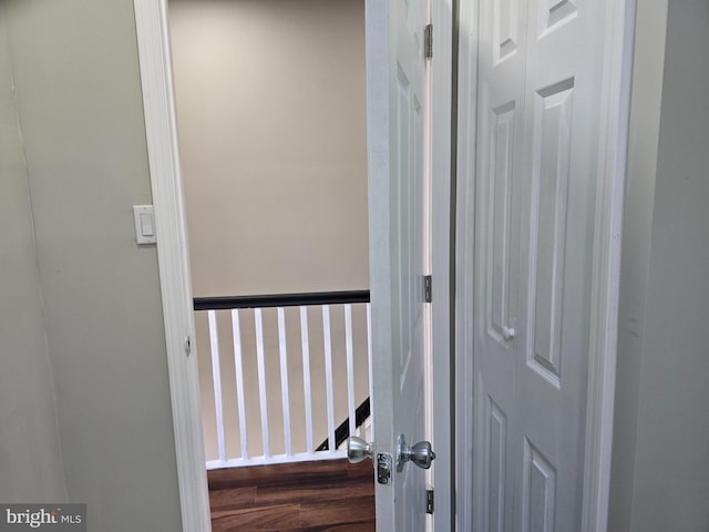 hallway with wood-type flooring