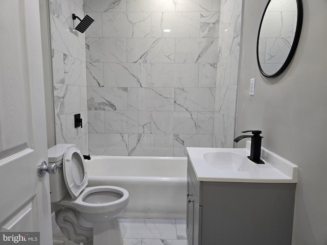 full bathroom with tile flooring, toilet, vanity, and tiled shower / bath