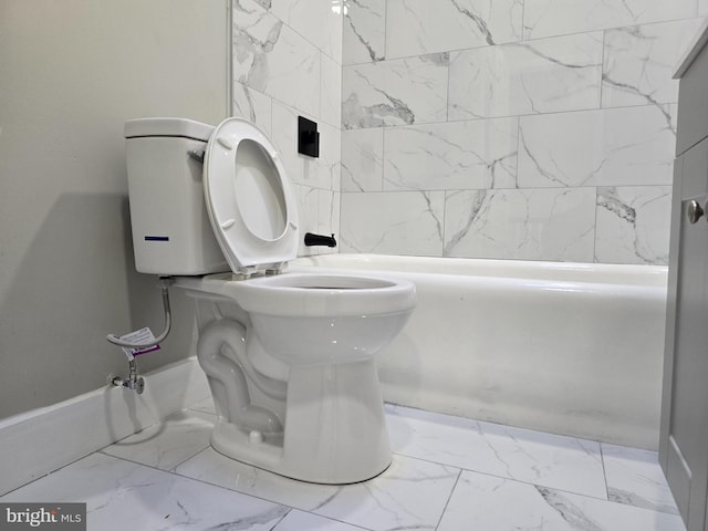 bathroom featuring toilet and tile flooring