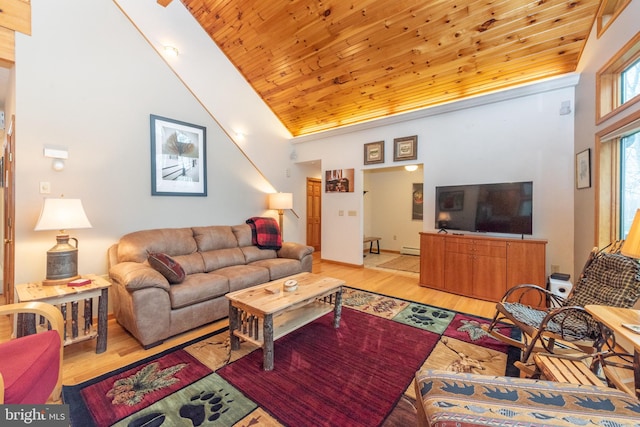 living room featuring wood ceiling, high vaulted ceiling, a baseboard heating unit, and light wood-type flooring