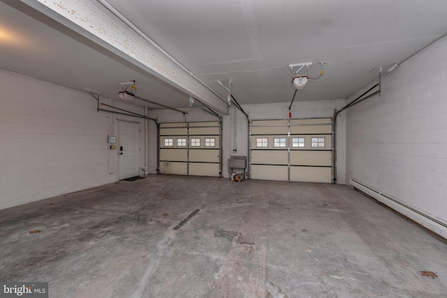 garage with baseboard heating