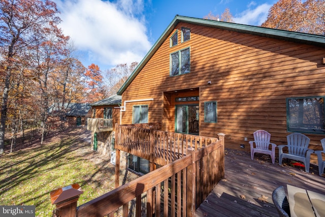 rear view of house with a deck