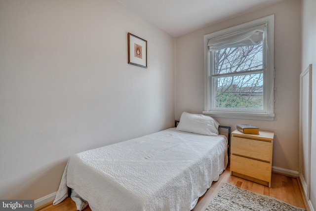 bedroom featuring wood-type flooring