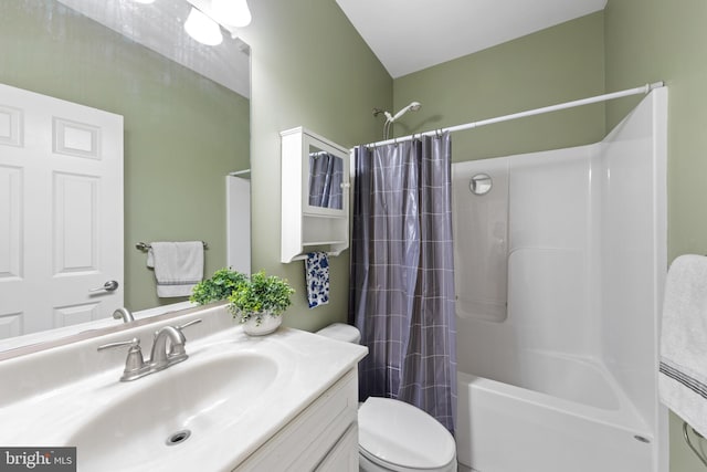 full bathroom featuring shower / bathtub combination with curtain, toilet, and vanity