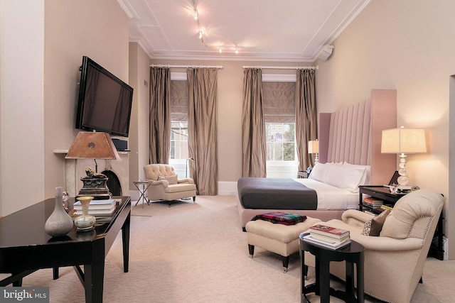 bedroom with crown molding and light carpet