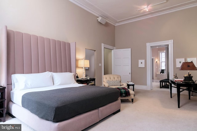 carpeted bedroom featuring a high ceiling and crown molding