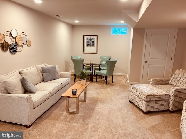 living room with light colored carpet