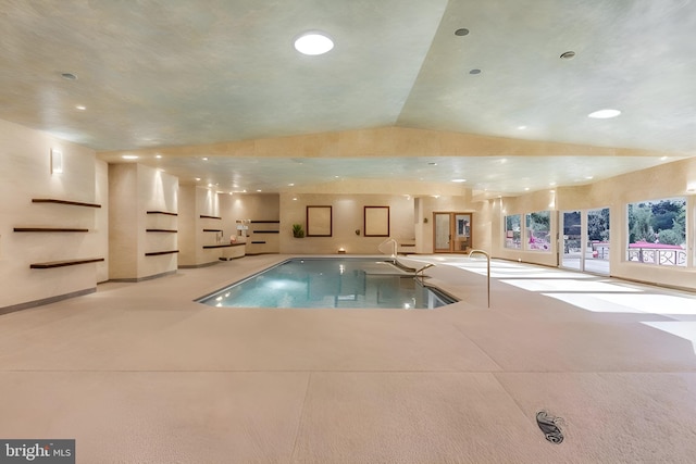 view of pool with a jacuzzi