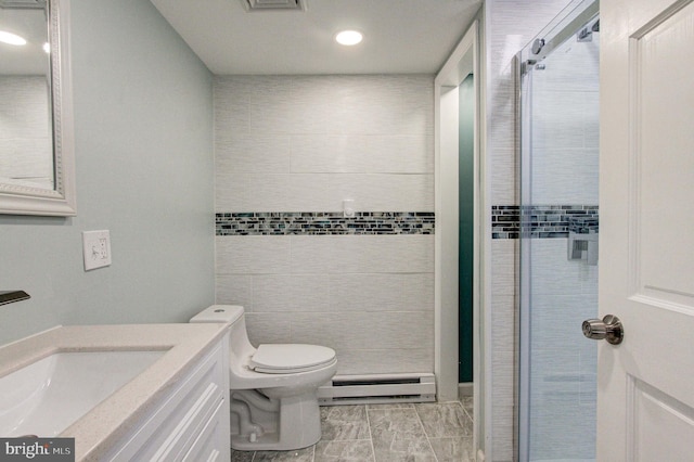 bathroom featuring toilet, a shower with door, tile floors, a baseboard radiator, and vanity